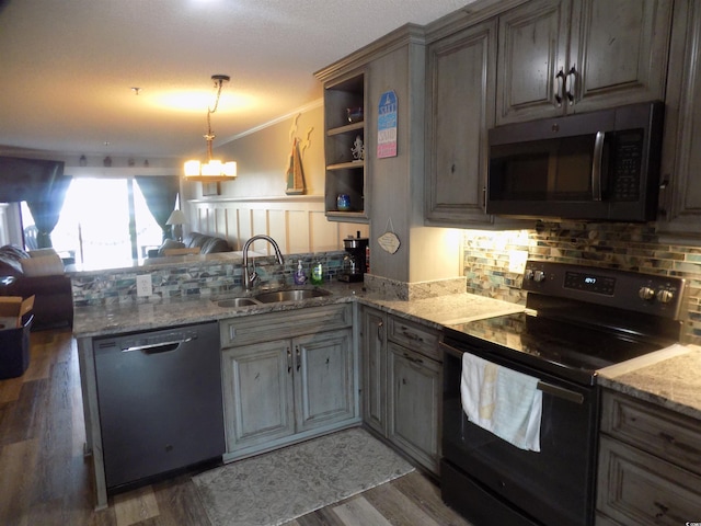 305 N Hillside Dr N Unit 103, North Myrtle Beach, SC 29582 - kitchen featuring black range with electric cooktop, dishwasher, a sink, a peninsula, and open floor plan