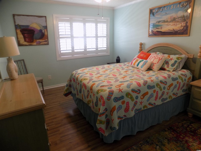 305 N Hillside Dr N Unit 103, North Myrtle Beach, SC 29582 - bedroom with wood finished floors, crown molding, and baseboards