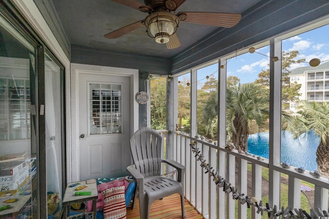 305 N Hillside Dr N Unit 103, North Myrtle Beach, SC 29582 - sunroom / solarium featuring a ceiling fan