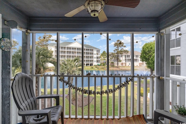 305 N Hillside Dr N Unit 103, North Myrtle Beach, SC 29582 - sunroom featuring a water view and a ceiling fan