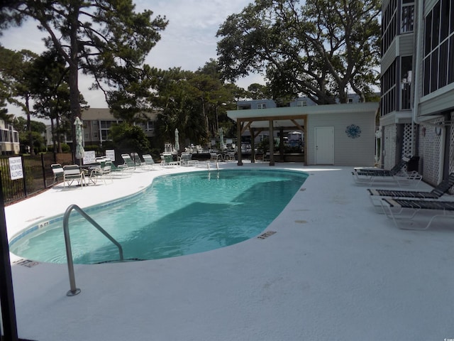 305 N Hillside Dr N Unit 103, North Myrtle Beach, SC 29582 - community pool featuring a patio
