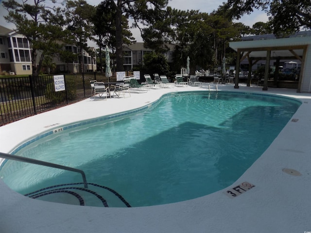 305 N Hillside Dr N Unit 103, North Myrtle Beach, SC 29582 - community pool featuring a patio