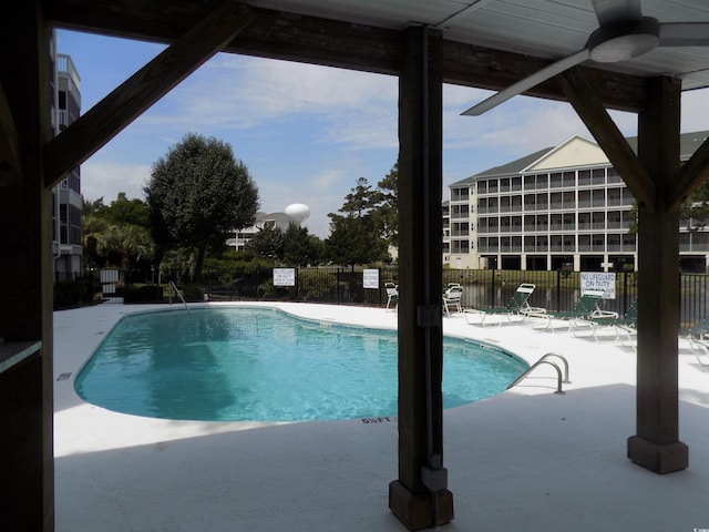 305 N Hillside Dr N Unit 103, North Myrtle Beach, SC 29582 - community pool with a patio area and ceiling fan