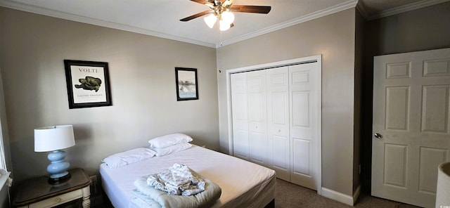 1100 Commons Blvd Unit 606, Myrtle Beach, SC 29572 - bedroom featuring dark colored carpet, crown molding, baseboards, a closet, and a ceiling fan