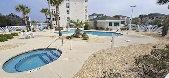 1100 Commons Blvd Unit 606, Myrtle Beach, SC 29572 - community pool featuring a community hot tub and a patio