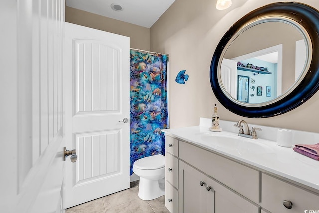 full bath with curtained shower, toilet, vanity, and tile patterned floors