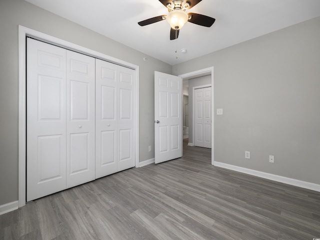 4854 Meadowsweet Dr Unit 1909, Myrtle Beach, SC 29579 - unfurnished bedroom featuring wood finished floors, a closet, and a ceiling fan