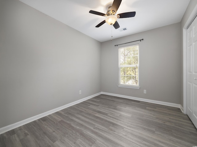 4854 Meadowsweet Dr Unit 1909, Myrtle Beach, SC 29579 - unfurnished bedroom with wood finished floors, a closet, and a ceiling fan