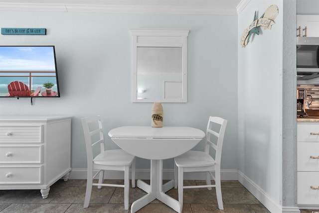 9550 Shore Dr Unit 1026, Myrtle Beach, SC 29572 - tiled dining area with ornamental molding and baseboards