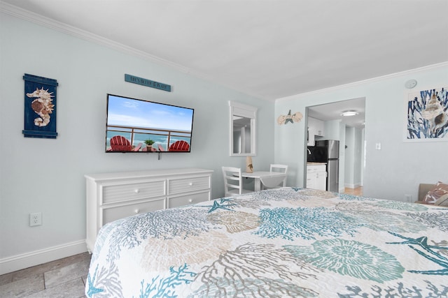 9550 Shore Dr Unit 1026, Myrtle Beach, SC 29572 - bedroom with ornamental molding, baseboards, freestanding refrigerator, and light stone finish floors