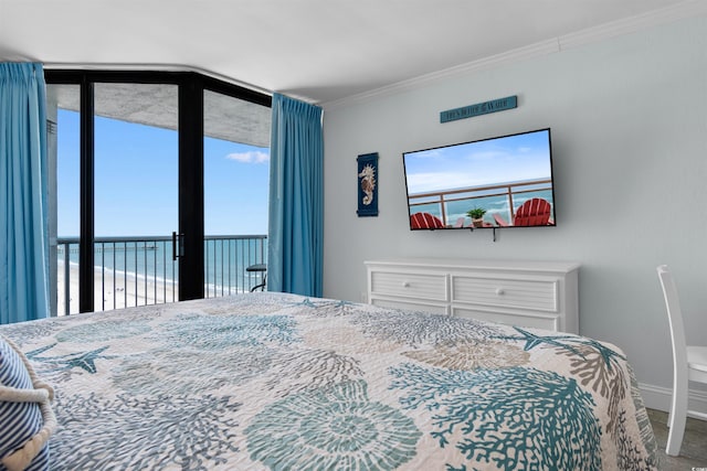 9550 Shore Dr Unit 1026, Myrtle Beach, SC 29572 - bedroom with crown molding, access to exterior, and baseboards