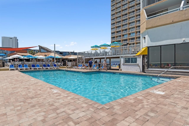 9550 Shore Dr Unit 1026, Myrtle Beach, SC 29572 - community pool with a patio area