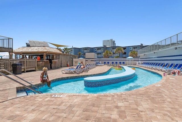 9550 Shore Dr Unit 1026, Myrtle Beach, SC 29572 - community pool featuring a patio area