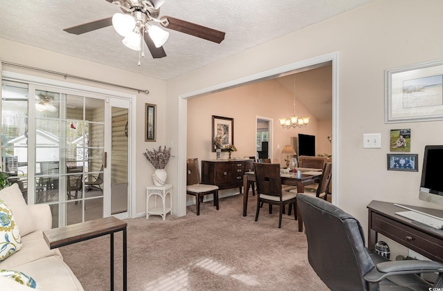 home office with baseboards, a textured ceiling, ceiling fan with notable chandelier, and light carpet