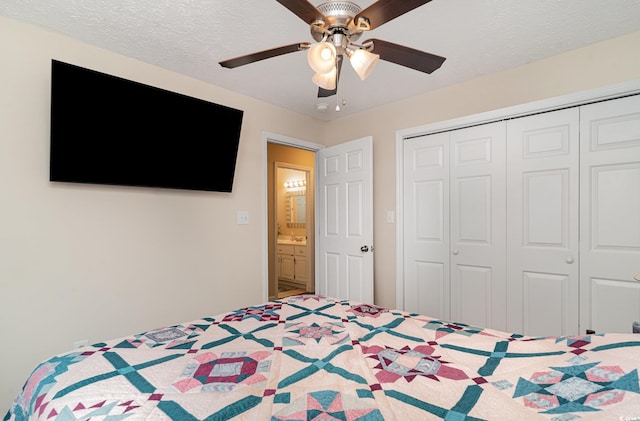 bedroom featuring a closet and a ceiling fan