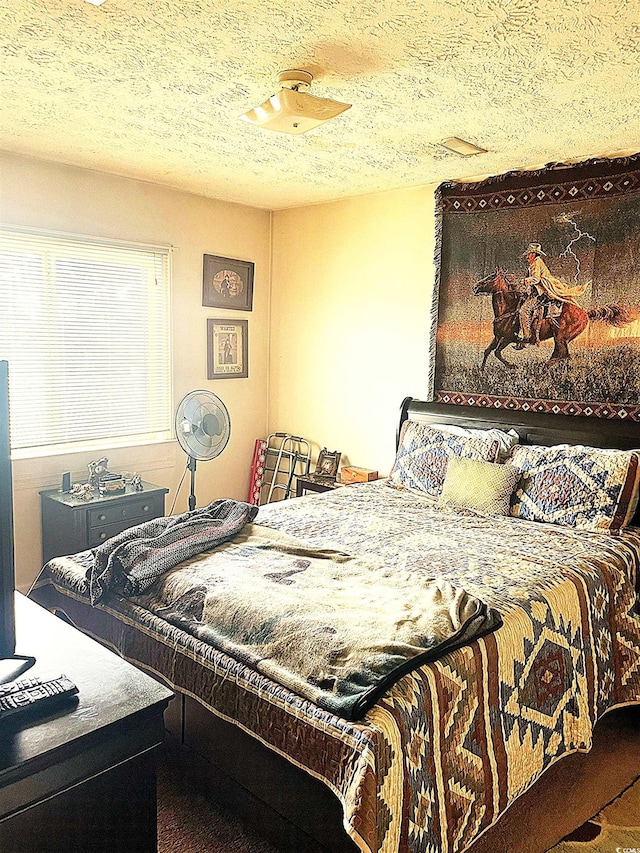 1600 Deer Creek Rd Unit A, Surfside Beach, SC 29575 - bedroom with a textured ceiling