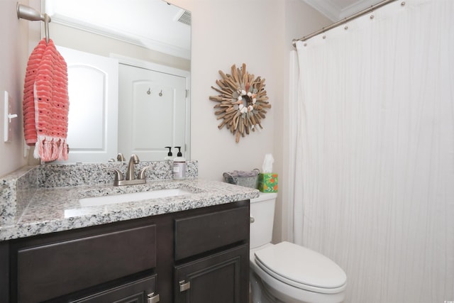 full bath with vanity, ornamental molding, toilet, and visible vents