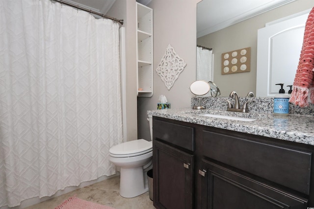 full bathroom featuring vanity, ornamental molding, and toilet