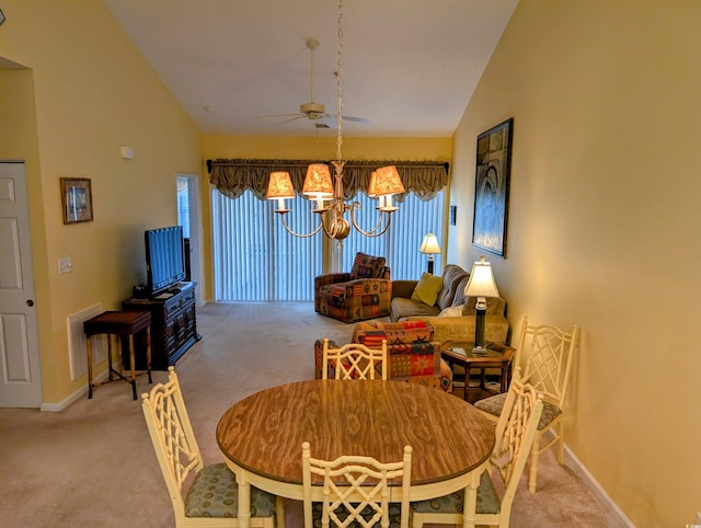 601 Hillside Dr N Unit 2245, North Myrtle Beach, SC 29582 - dining room with light colored carpet, lofted ceiling, a ceiling fan, a chandelier, and baseboards