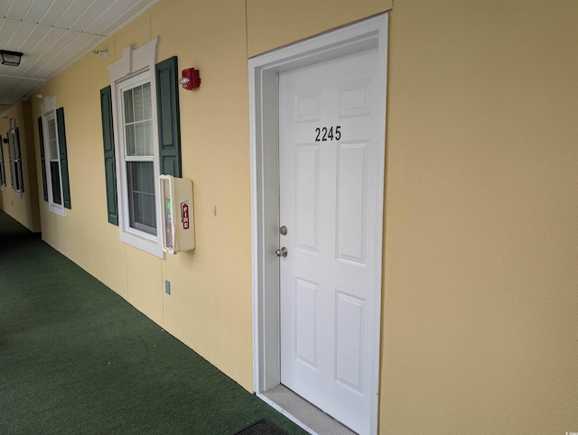 601 Hillside Dr N Unit 2245, North Myrtle Beach, SC 29582 - doorway to property with stucco siding