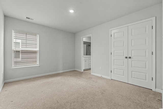 852 Harrison Mill St, Myrtle Beach, SC 29579 - unfurnished bedroom with carpet, a closet, ensuite bathroom, and recessed lighting