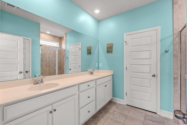 852 Harrison Mill St, Myrtle Beach, SC 29579 - full bath with a stall shower, double vanity, and tile patterned floors