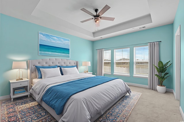 852 Harrison Mill St, Myrtle Beach, SC 29579 - carpeted bedroom featuring a raised ceiling and ceiling fan