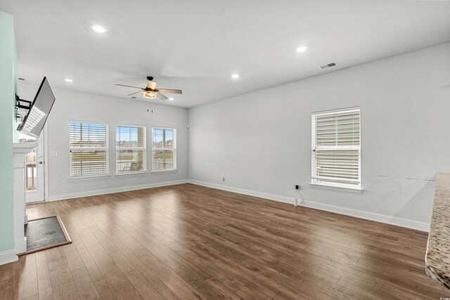 852 Harrison Mill St, Myrtle Beach, SC 29579 - unfurnished living room featuring a ceiling fan, wood-type flooring, and recessed lighting
