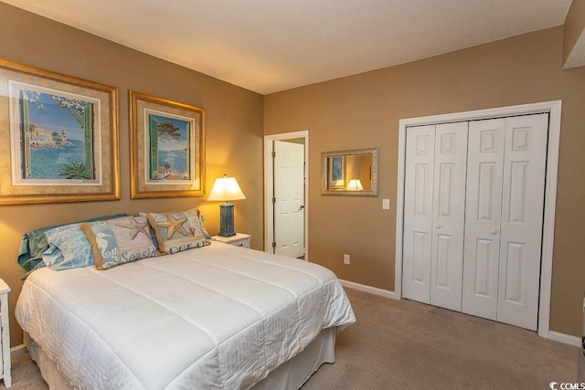 1221 Tidewater Dr Unit 1922, North Myrtle Beach, SC 29582 - bedroom featuring carpet, baseboards, and a closet