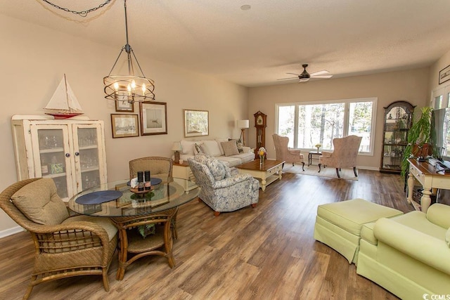 1221 Tidewater Dr Unit 1922, North Myrtle Beach, SC 29582 - living area featuring wood finished floors, ceiling fan, a chandelier, and baseboards