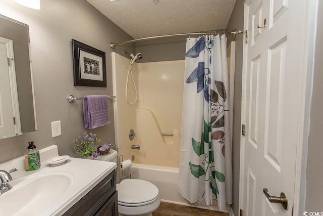 1221 Tidewater Dr Unit 1922, North Myrtle Beach, SC 29582 - full bath featuring a textured ceiling, vanity, shower / bathtub combination with curtain, wood finished floors, and toilet