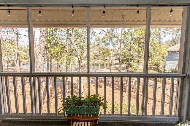 1221 Tidewater Dr Unit 1922, North Myrtle Beach, SC 29582 - sunroom with a water view and view of wooded area
