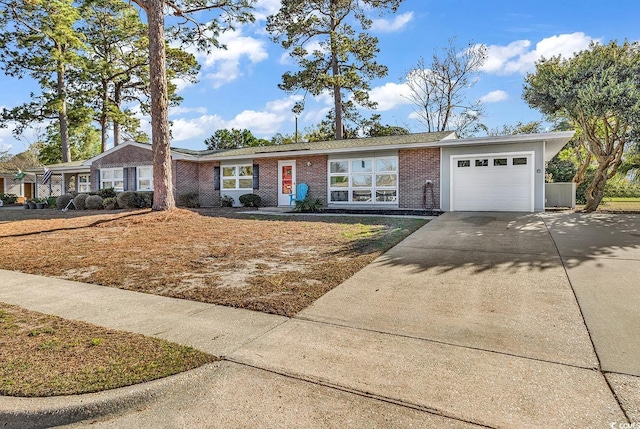 3783 Vine St Unit 3783, Myrtle Beach, SC 29577 - ranch-style house featuring brick siding, concrete driveway, and a garage