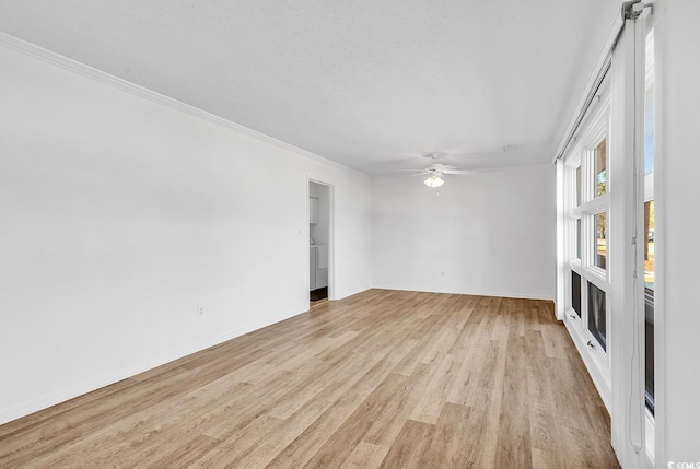 3783 Vine St Unit 3783, Myrtle Beach, SC 29577 - unfurnished room featuring baseboards, a textured ceiling, a ceiling fan, and light wood finished floors