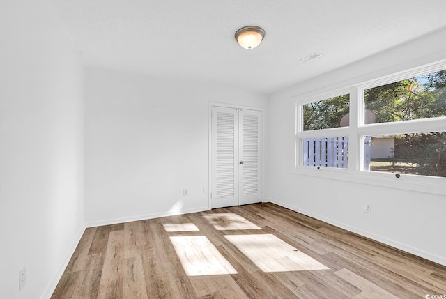 3783 Vine St Unit 3783, Myrtle Beach, SC 29577 - empty room with baseboards, visible vents, and wood finished floors