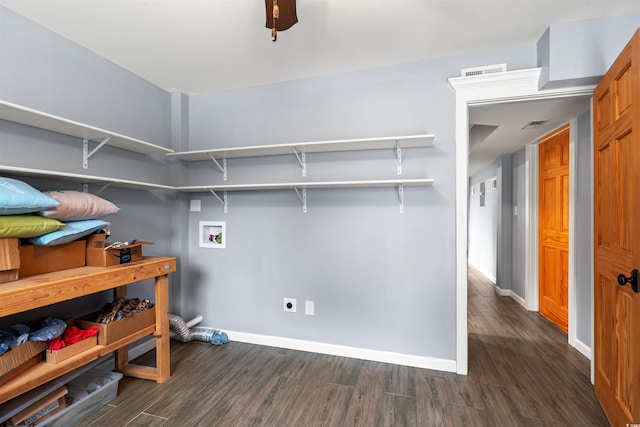 laundry area featuring electric dryer hookup, dark wood-style flooring, washer hookup, and visible vents
