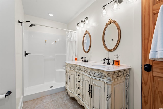 bathroom with double vanity, a sink, and a shower with shower curtain