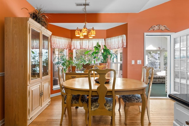 808 Arbor Ln, North Myrtle Beach, SC 29582 - dining space featuring a chandelier and light wood-style floors