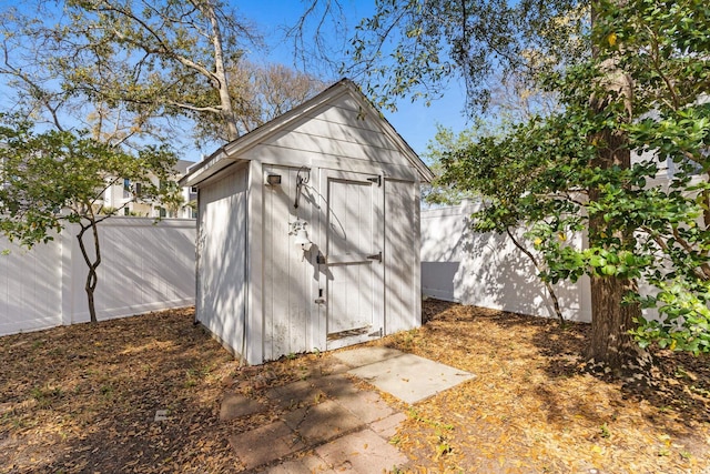 808 Arbor Ln, North Myrtle Beach, SC 29582 - view of shed with a fenced backyard