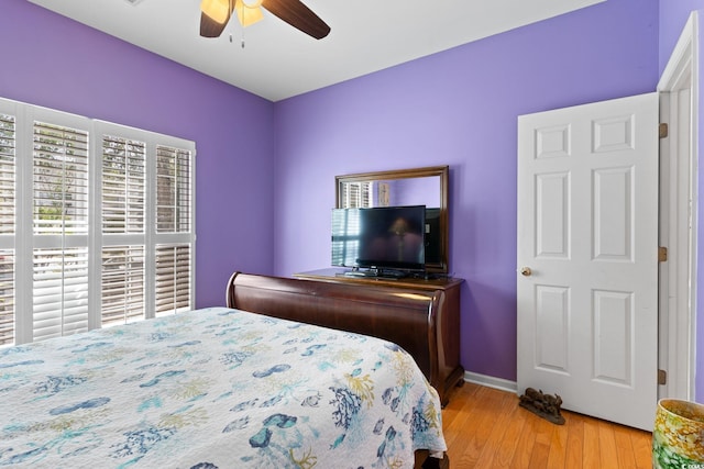 808 Arbor Ln, North Myrtle Beach, SC 29582 - bedroom with light wood-style flooring and ceiling fan