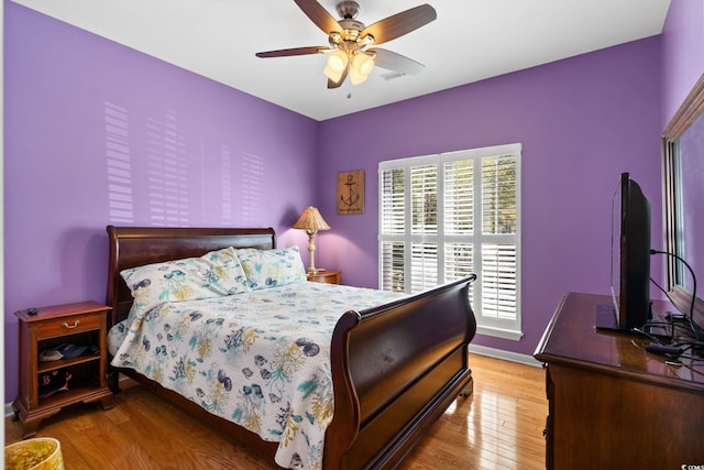 808 Arbor Ln, North Myrtle Beach, SC 29582 - bedroom with wood finished floors and ceiling fan