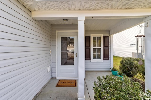 doorway to property featuring a porch