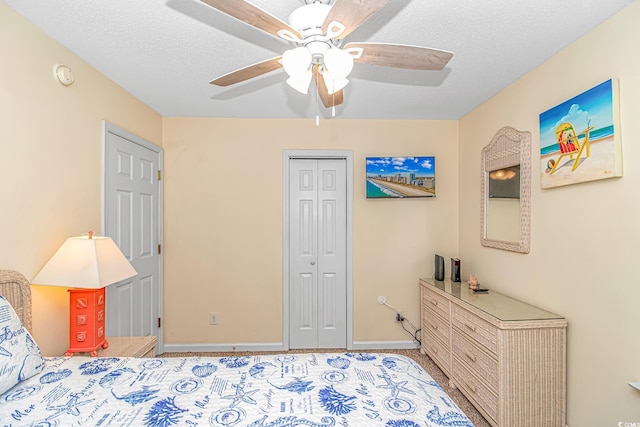 6001-310 S Kings Hwy, Myrtle Beach, SC 29575 - bedroom with a closet, a ceiling fan, and a textured ceiling