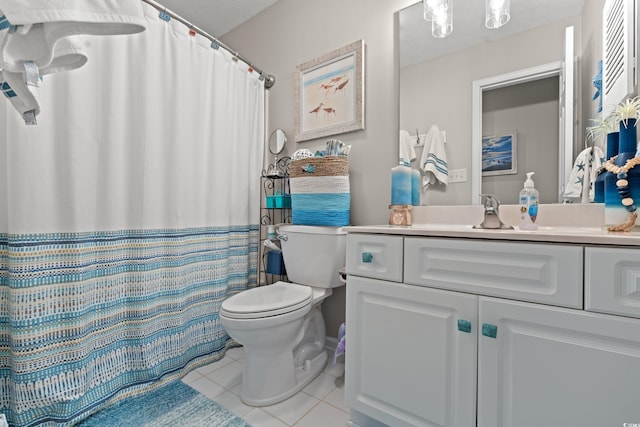 bathroom featuring tile patterned floors, vanity, toilet, and a shower with shower curtain