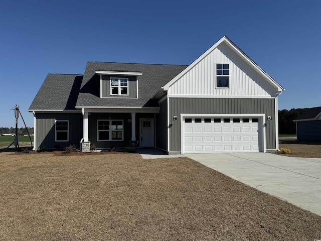 1353 White Oak Ln, Galivants Ferry, SC 29544 - modern farmhouse with roof with shingles, a garage, board and batten siding, and concrete driveway
