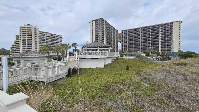 415 Ocean Creek Dr Unit 2443, Myrtle Beach, SC 29572 - dock area featuring a wooden deck and a gazebo