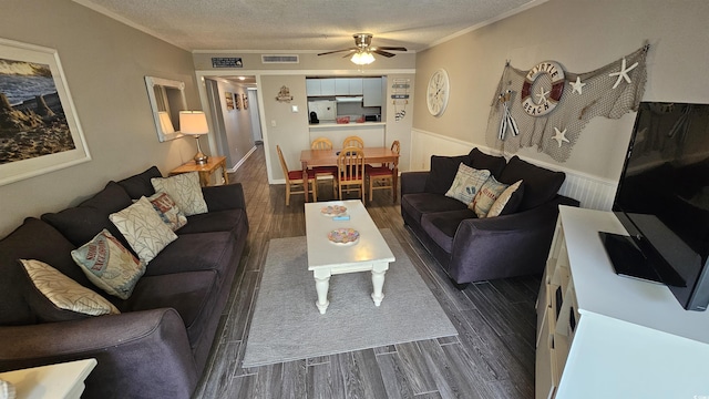 415 Ocean Creek Dr Unit 2443, Myrtle Beach, SC 29572 - living area featuring dark wood finished floors, ceiling fan, a textured ceiling, and crown molding