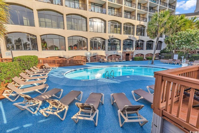 pool with a patio
