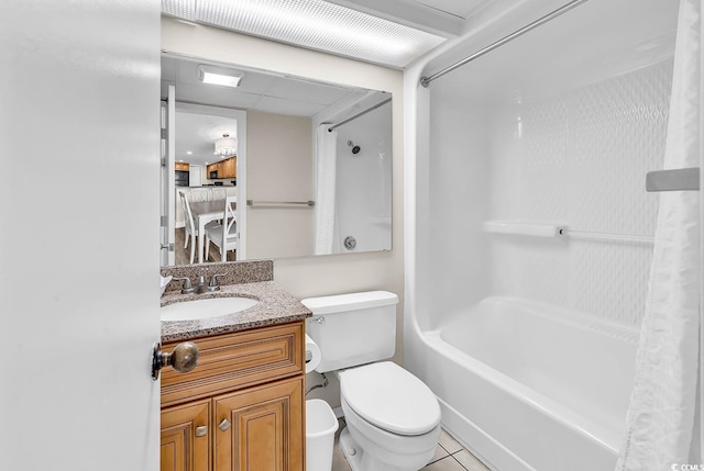 bathroom with toilet, shower / bath combo with shower curtain, and vanity