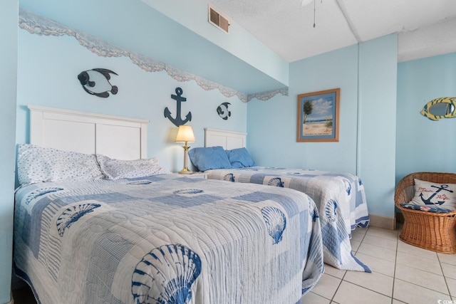 bedroom with visible vents and tile patterned flooring